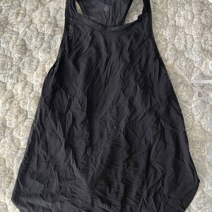 Black lululemon tank with hole cut out details. Size 4.